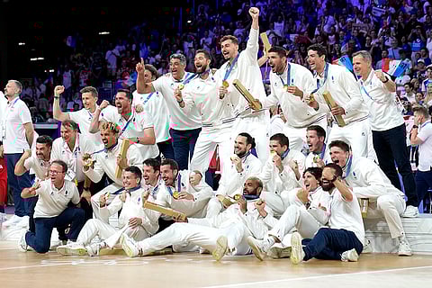 2024 Paris Olympics Men's volleyball: French team poses with their gold medals